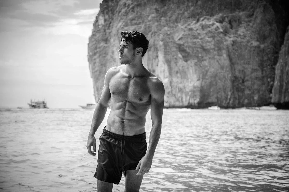 Man wearing premium swimsuit from Rugged Reign